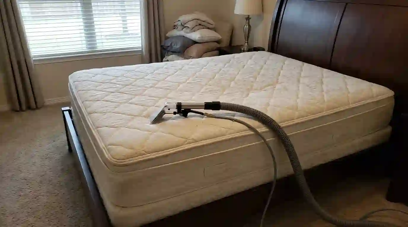 Bare queen mattress ready for low-moisture cleaning
